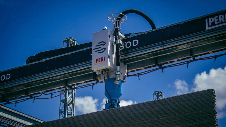 3D printer being used to build an apartment building on site in France
