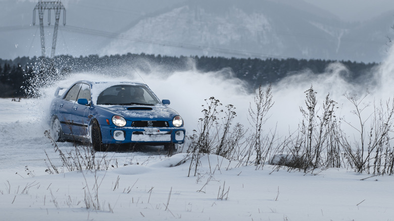 Subaru Impreza driving snow