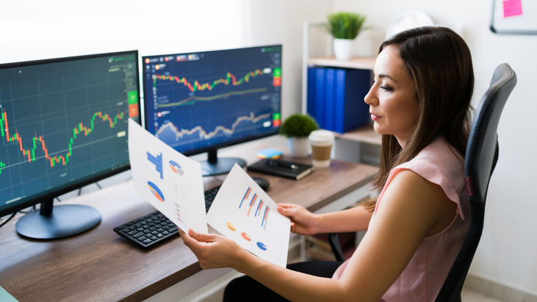 woman with multiple monitors