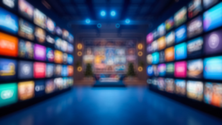 A blurry image of multiple TV screens showing different streaming apps