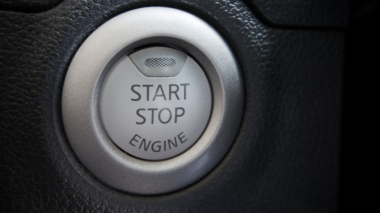 Engine start stop button in a car