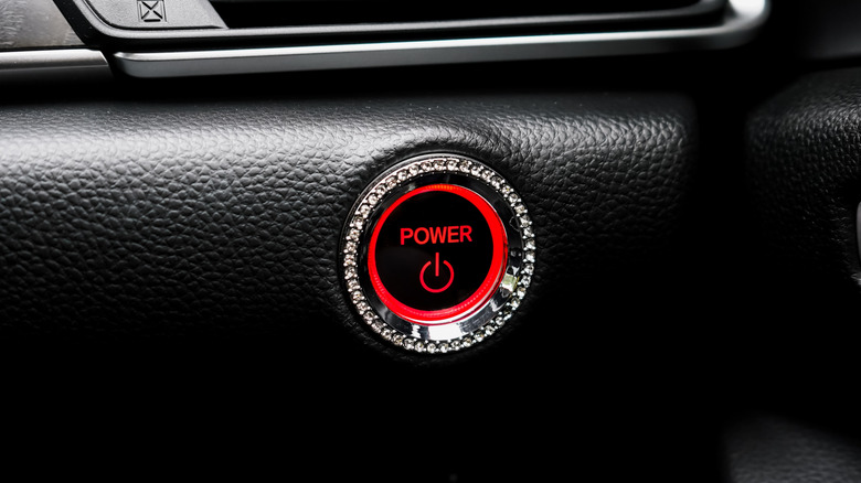 Engine start stop buttn in a car