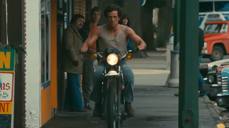 Sylvester Stallone riding Yamaha XT250 motorcycle