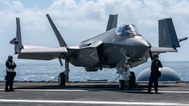 F-35C Lightning II landing on an aircraft carrier in 2023