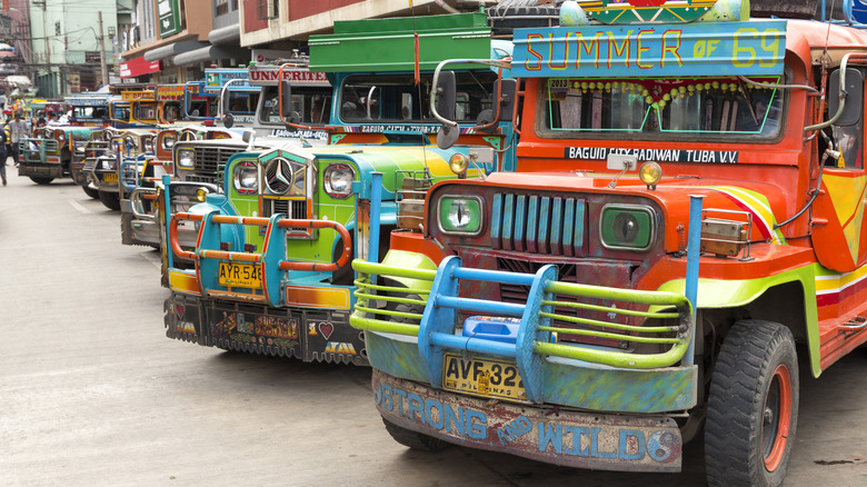 A row of parked jeepneys in Baguio City, the Philippines.