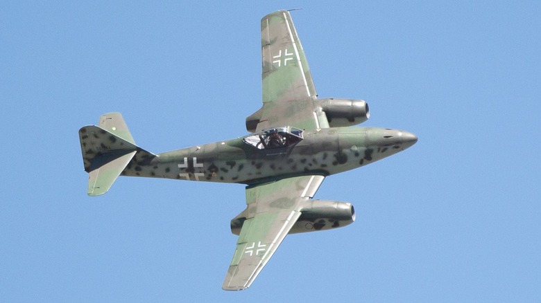 A Messerschmitt Me 262 flying over blue skies