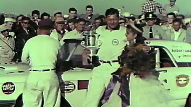 Beauchamp holding winner's trophy
