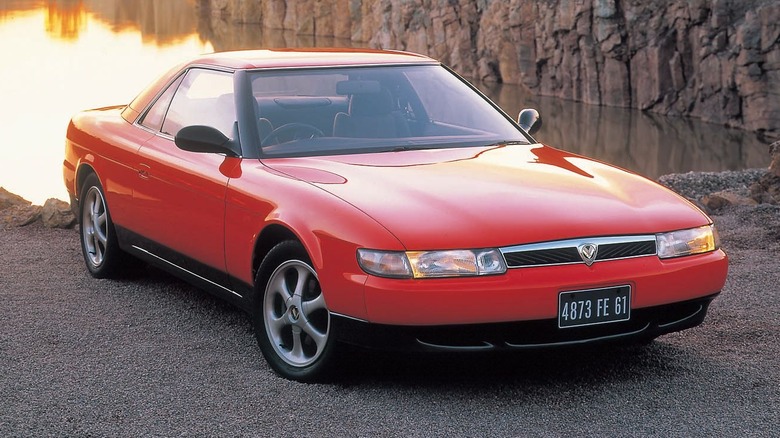 Eunos Cosmo by lake