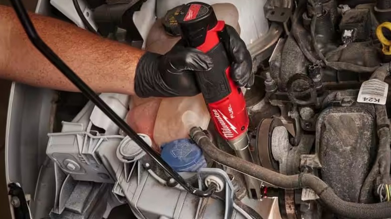 Milwaukee extended reach ratchet in engine