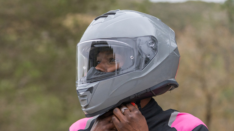 person looking through clear helmet visor