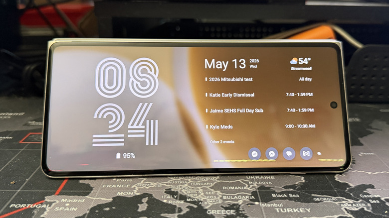 Motorola Razr Fold on a desk displaying a calendar