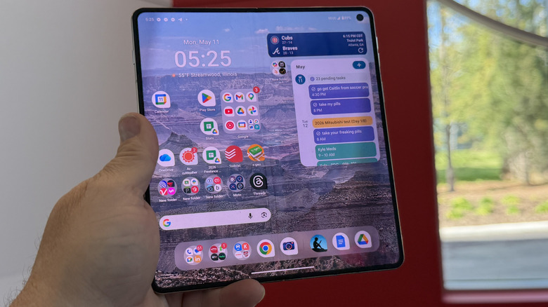 Man holding the Motorola Razr Fold