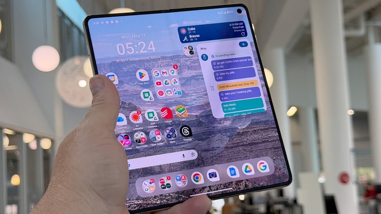 Man holding the Motorola Razr Fold