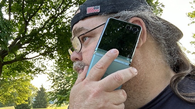 Man talking on Razr Plus