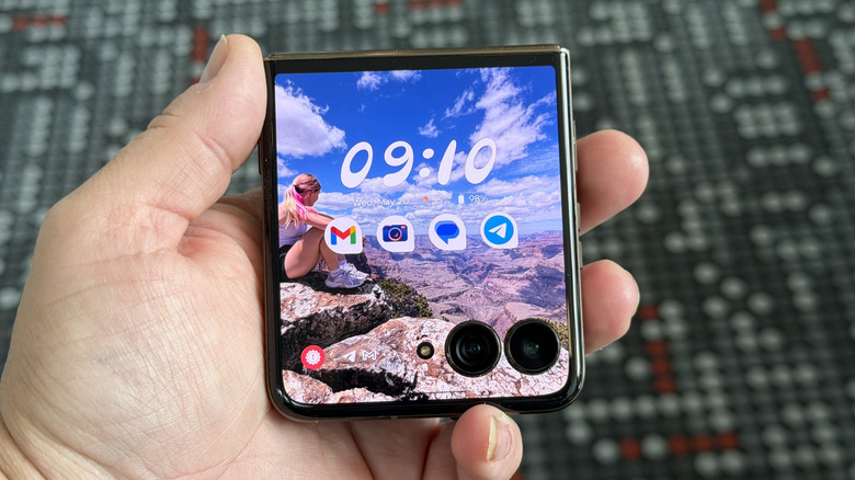 Man holding the Motorola Razr Ultra