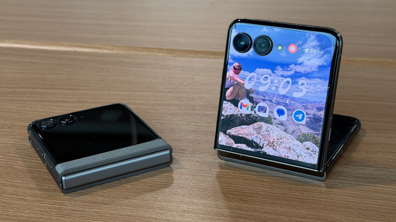 Two Razrs on a table