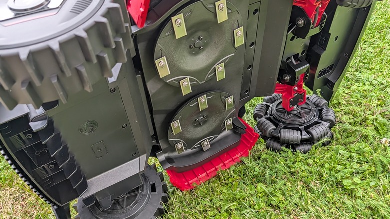 Mova mower under side blades and wheels.
