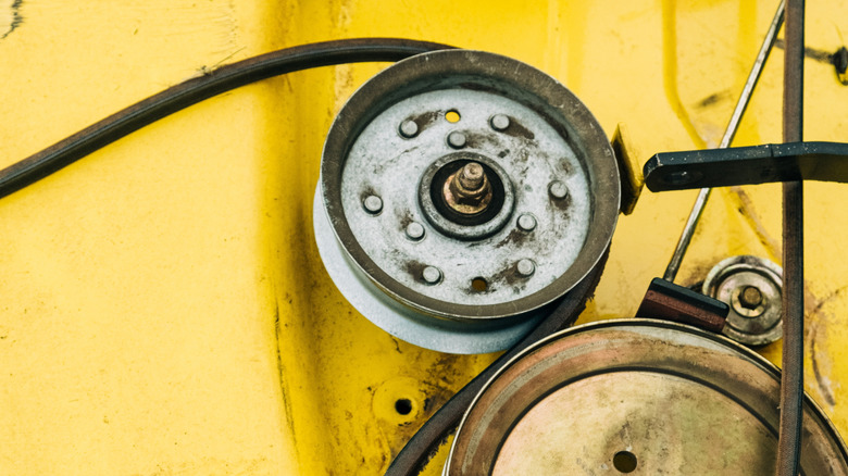 Close-up of belts on mower deck