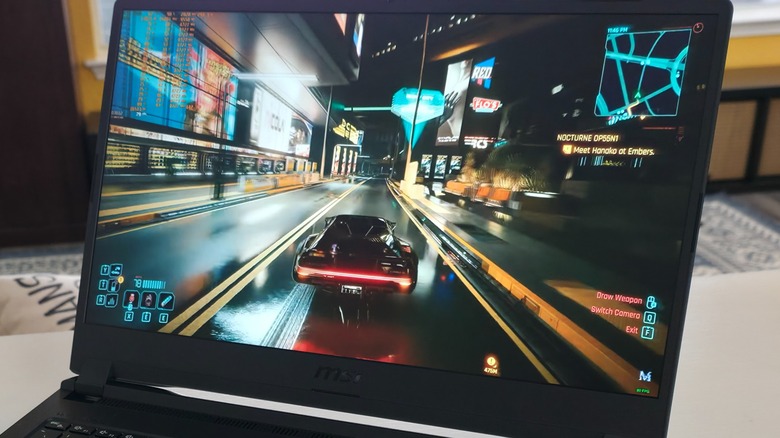 The MSI Cyborg 15 showing a benchmark test of Cyberpunk 2077