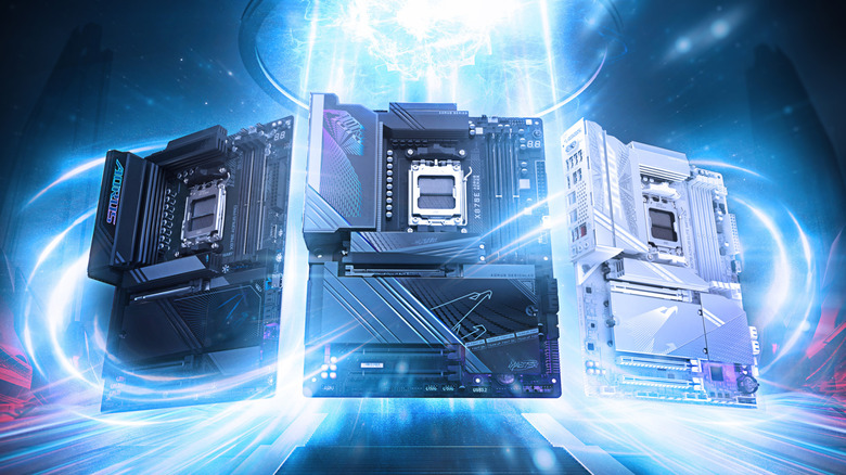Three Gigabyte Aorus AMD motherboards in promotional image