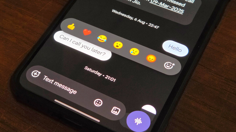 The emoji react menu on the Google Messages chat interface