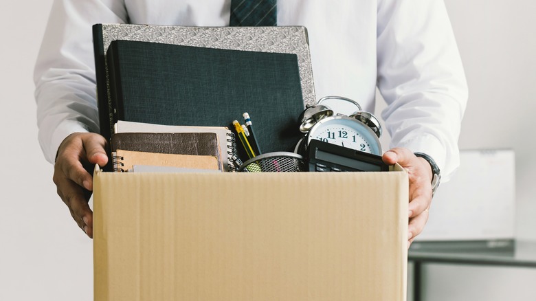 Fired employee with box