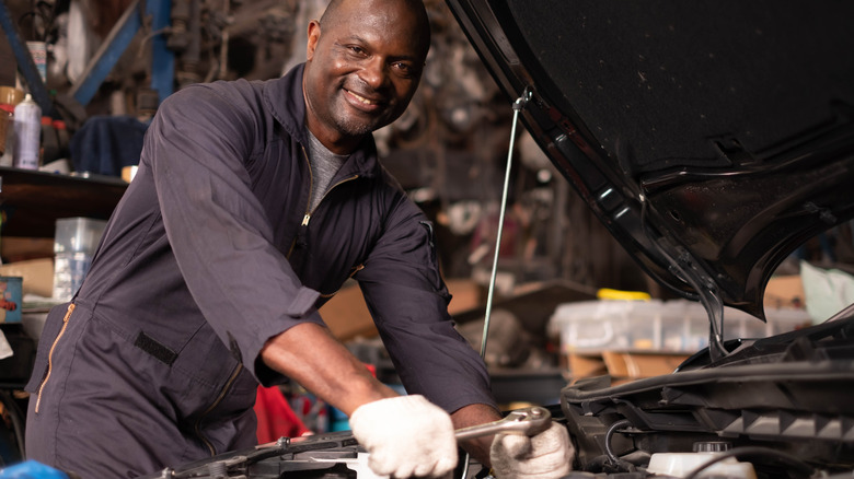 mechanic working on car