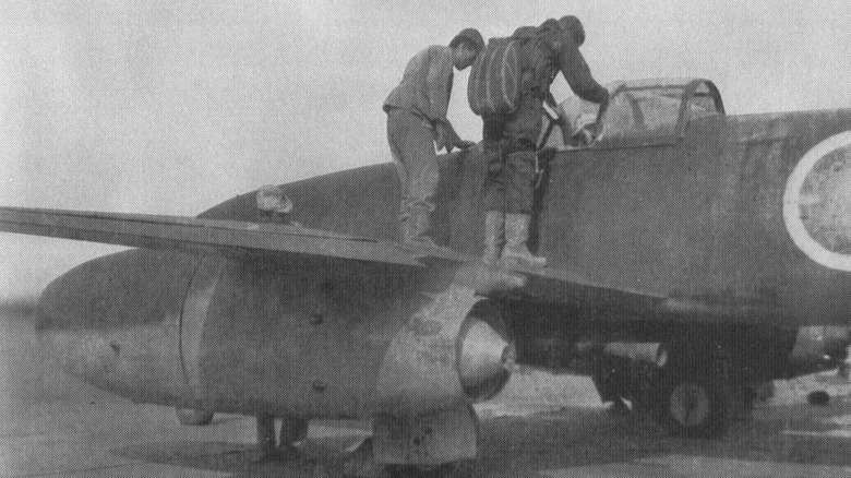 Men stand on Nakajima Kikka wing