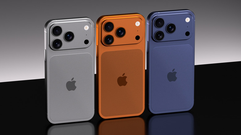 Silver, orange, and blue iPhone 17s Pros side by side.