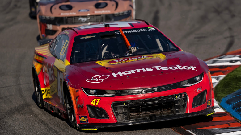 Ricky Stenhouse Chevy Camaro leading NASCAR pack at Charlotte road course