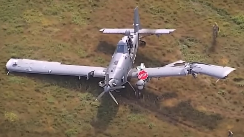A crashed National Guard plane on the ground