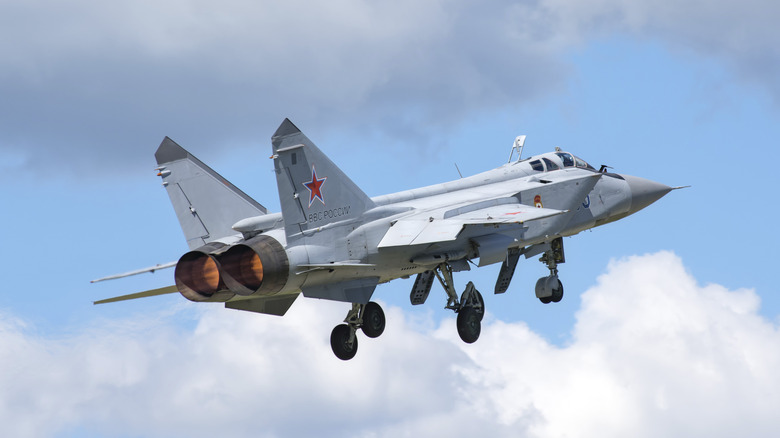 Russian MiG-31 Interceptor jet climbing altitude in the air