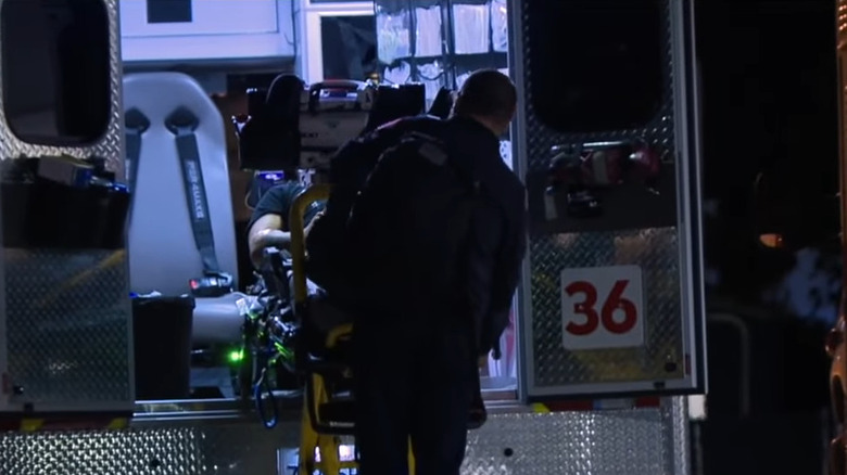 navy sailor in ambulance following crash