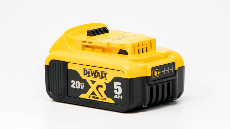 A DeWalt battery against a white background.