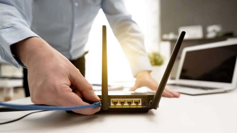 Man using router