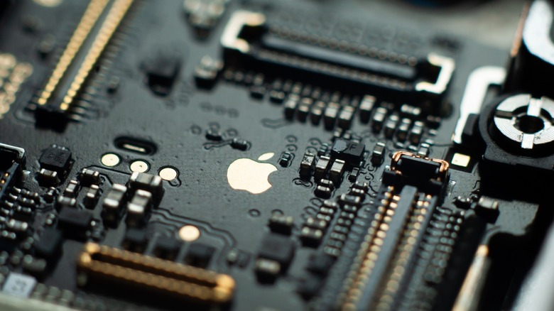 iPhone motherboard with Apple logo