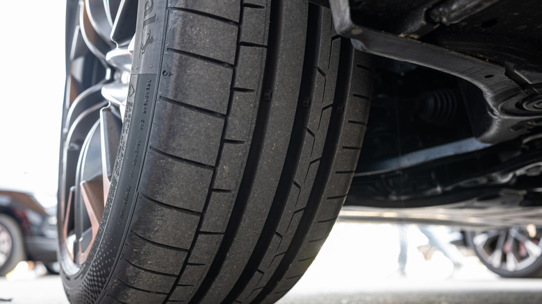 A close-up view of a car tire.
