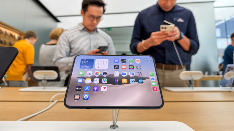 An unfolded iPhone Duo at an Apple Store