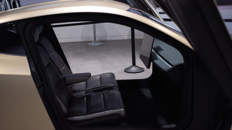 Cybercab cabin with no steering wheel or pedals