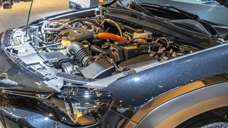 A Mazda MX-30 R-EV's hood popped open