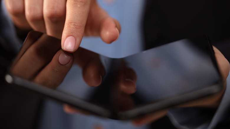 Foldable smartphone hands