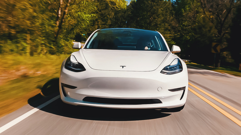 Tesla Model 3 driving road
