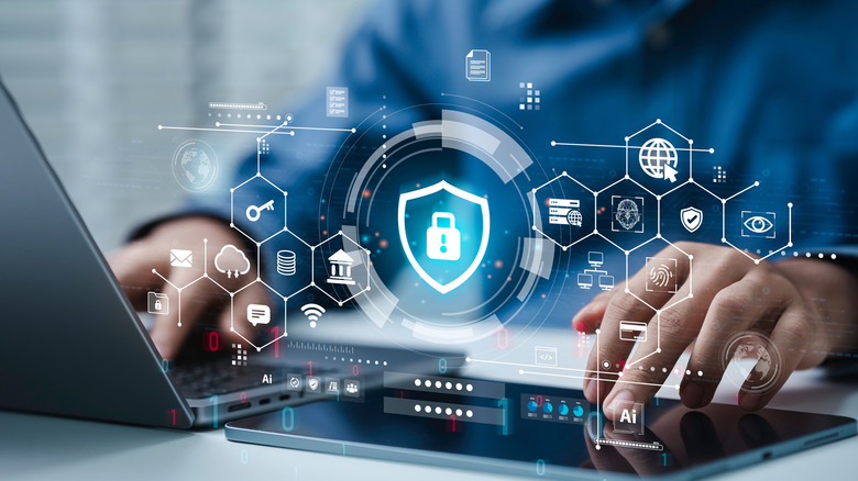 cybersecurity logos on laptop