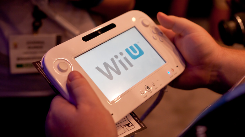 someone playing with Wii U controller