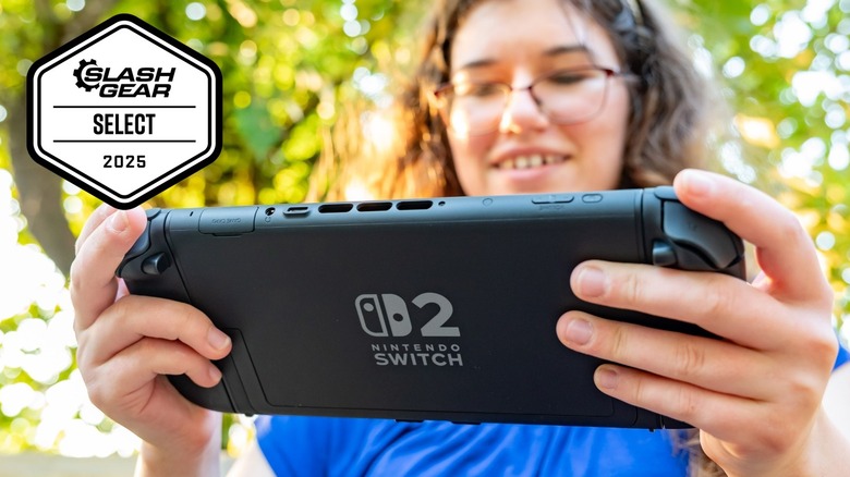 The Nintendo Switch 2 held in the hands of a person.