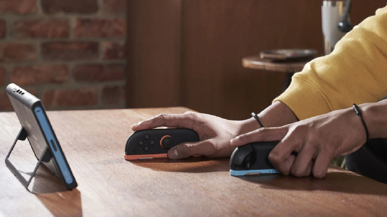 Someone playing the Switch 2 with the Joy-Cons in mouse mode.