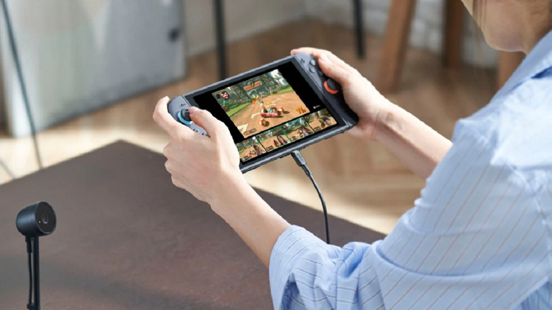 A Nintendo Switch 2 showing Mario Kart World in Handheld Mode.