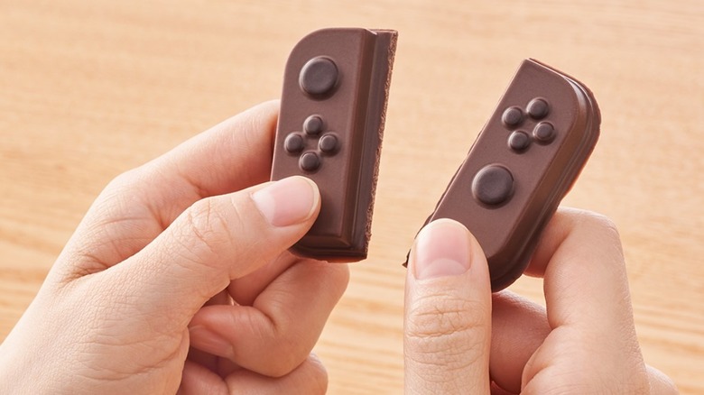 A chocolate Joy-Con broken in half