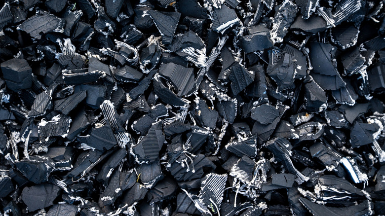 Close up of shredded black tire rubber