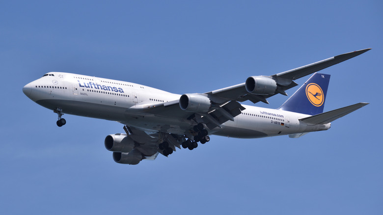 Boeing 747 flying over Boston